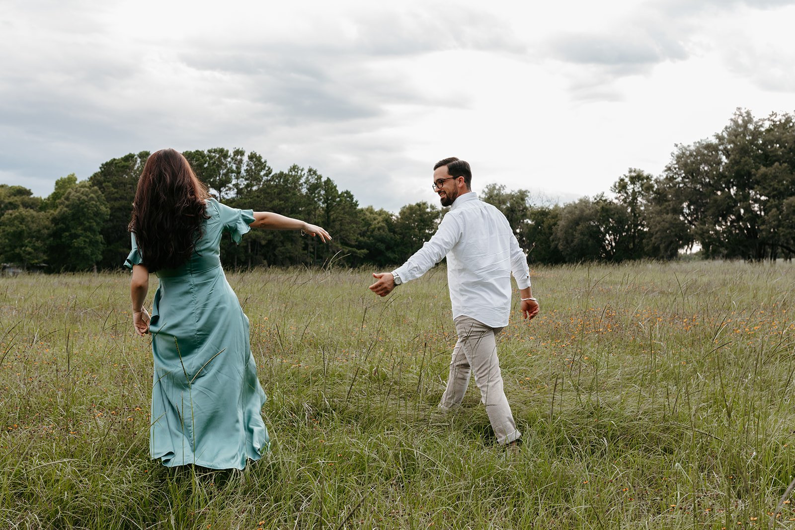 gainesville-engagement-photographer-wildflower-field-sid-ilva-1.jpg